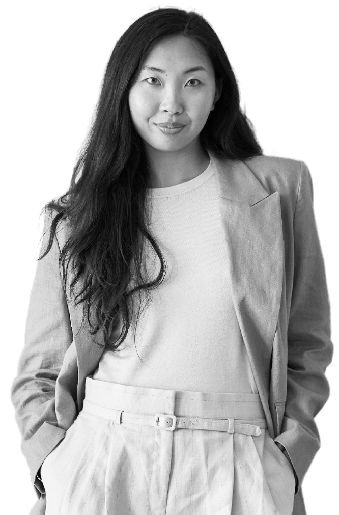 asian female standing with pockets in her hand